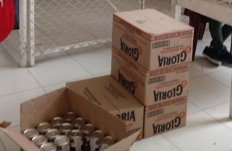 Municipalidad recibió  latas de leche achatadas